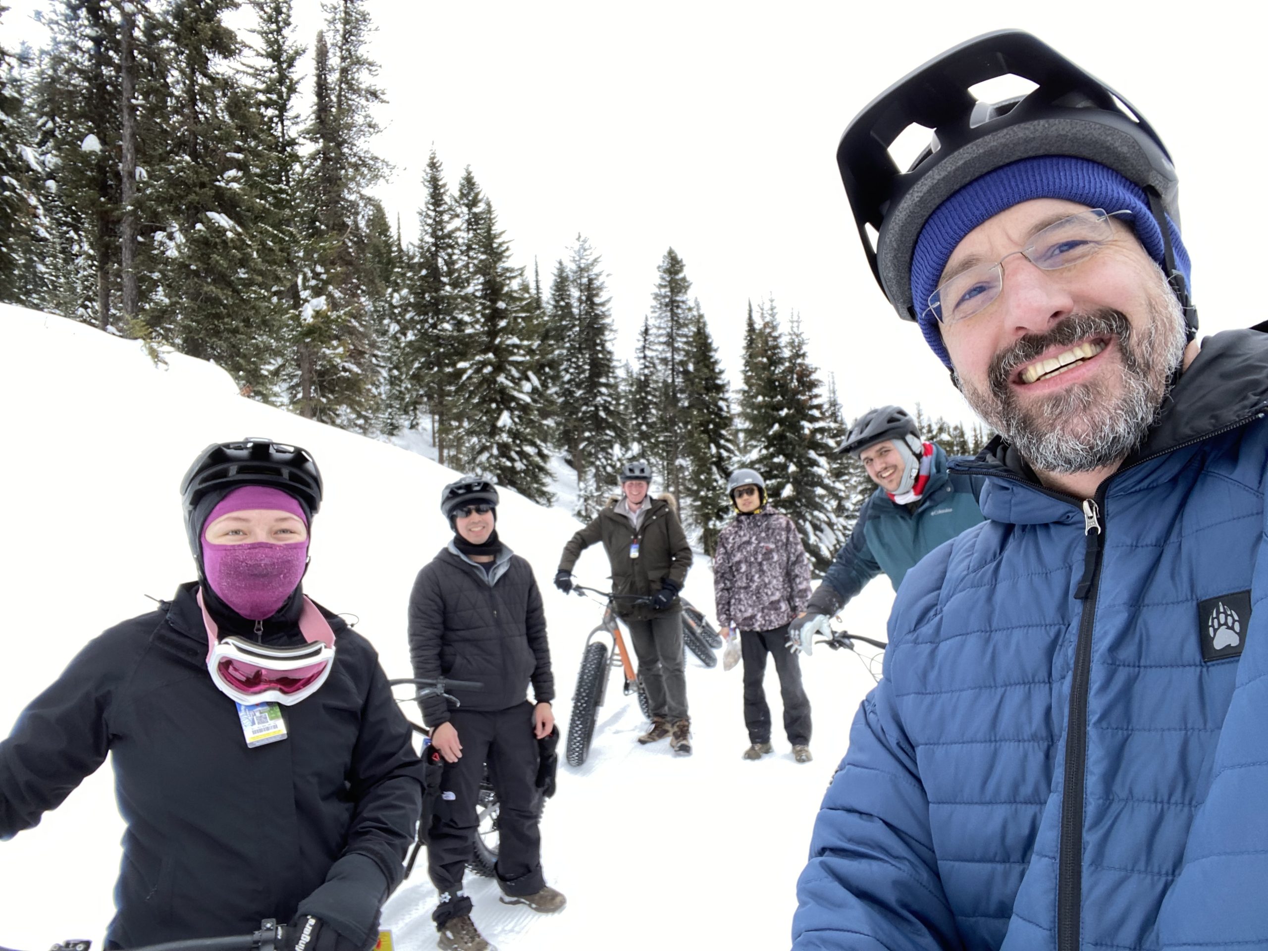 Lab on snow trail during fat tire biking in BC, Canada - 2023