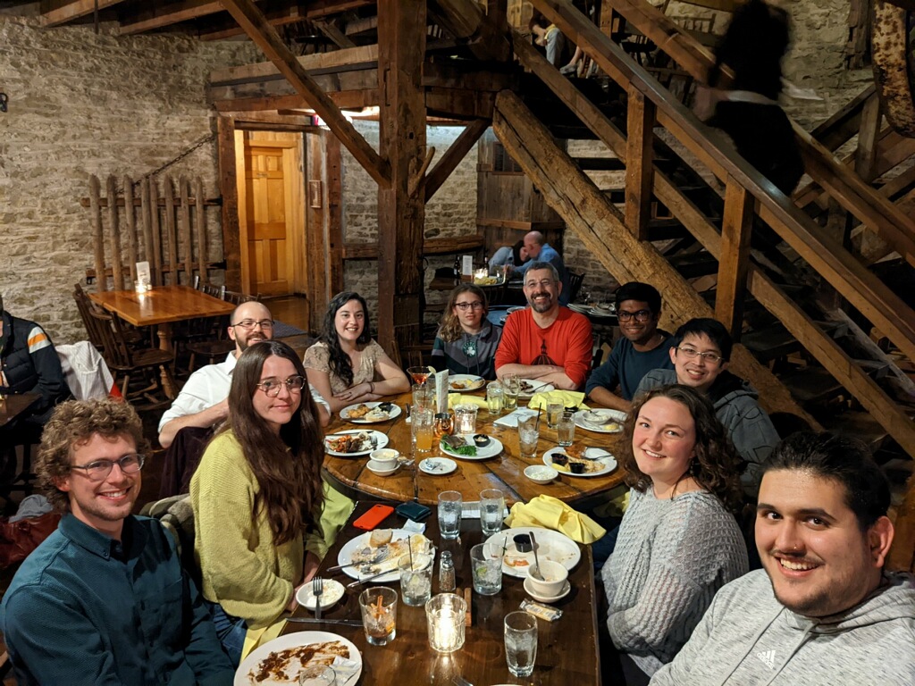 Lab photo at Mel's graduation celebration dinner