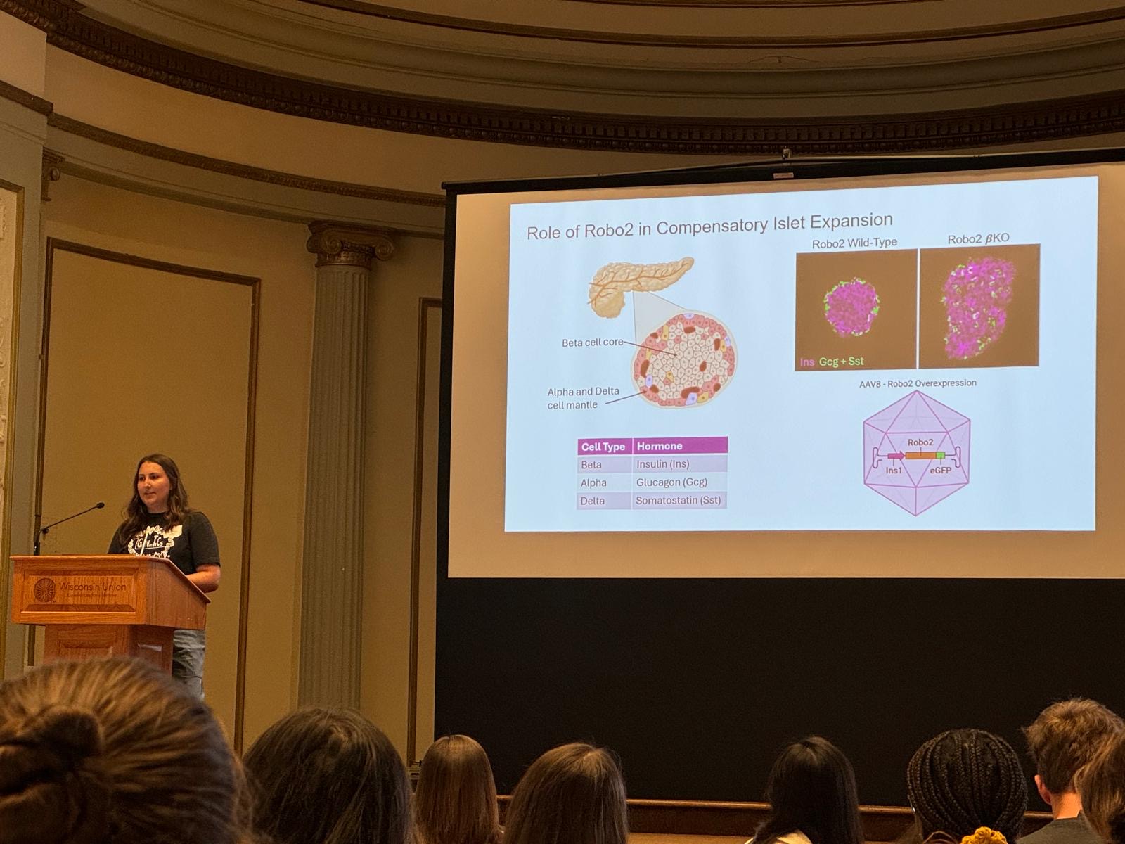 Rachel giving a lightning talk at the Genetics Program Symposium in September, 2024