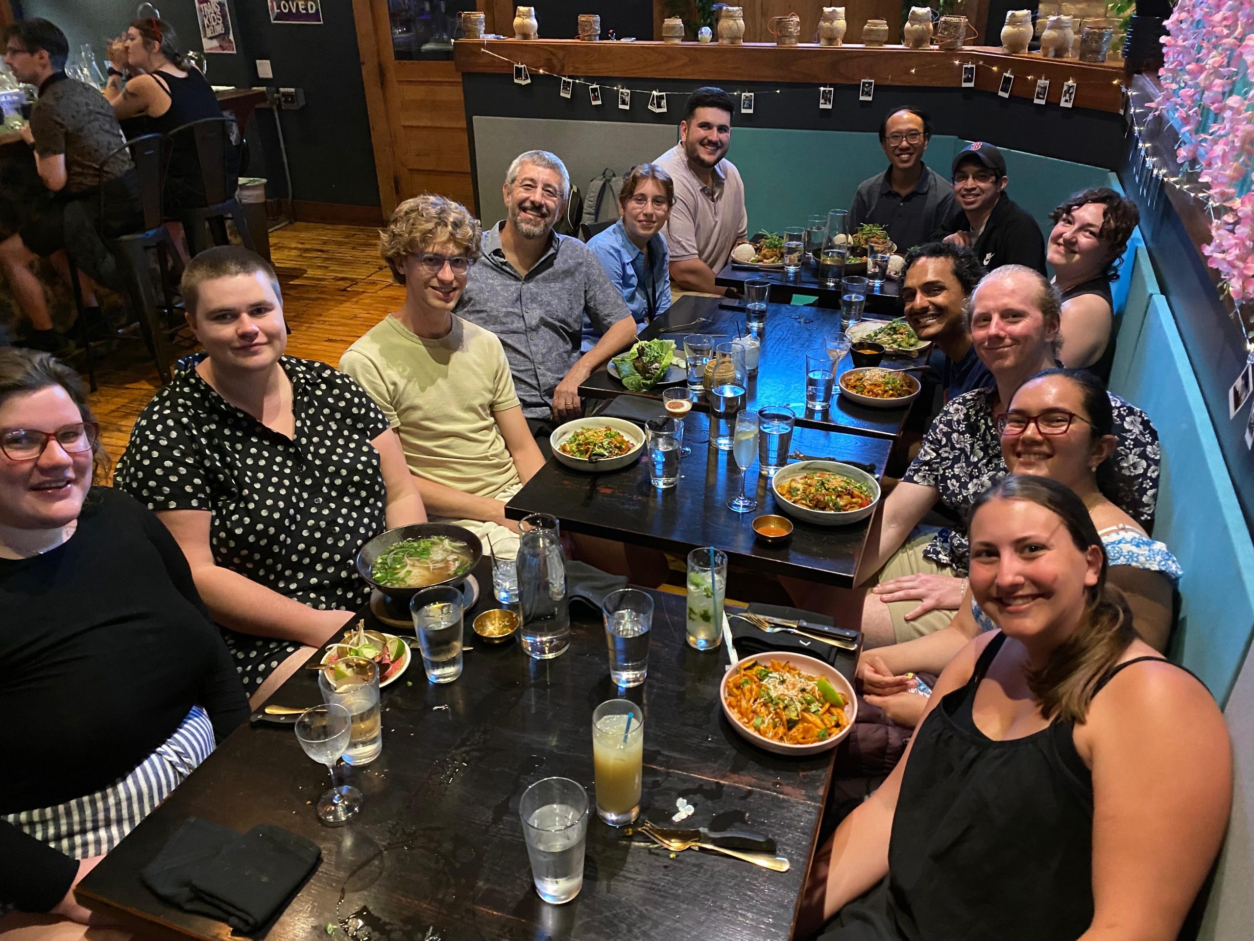 Lab members and their friends eating dinner at Ahan to morn Dex leaving on July 23rd, 2025