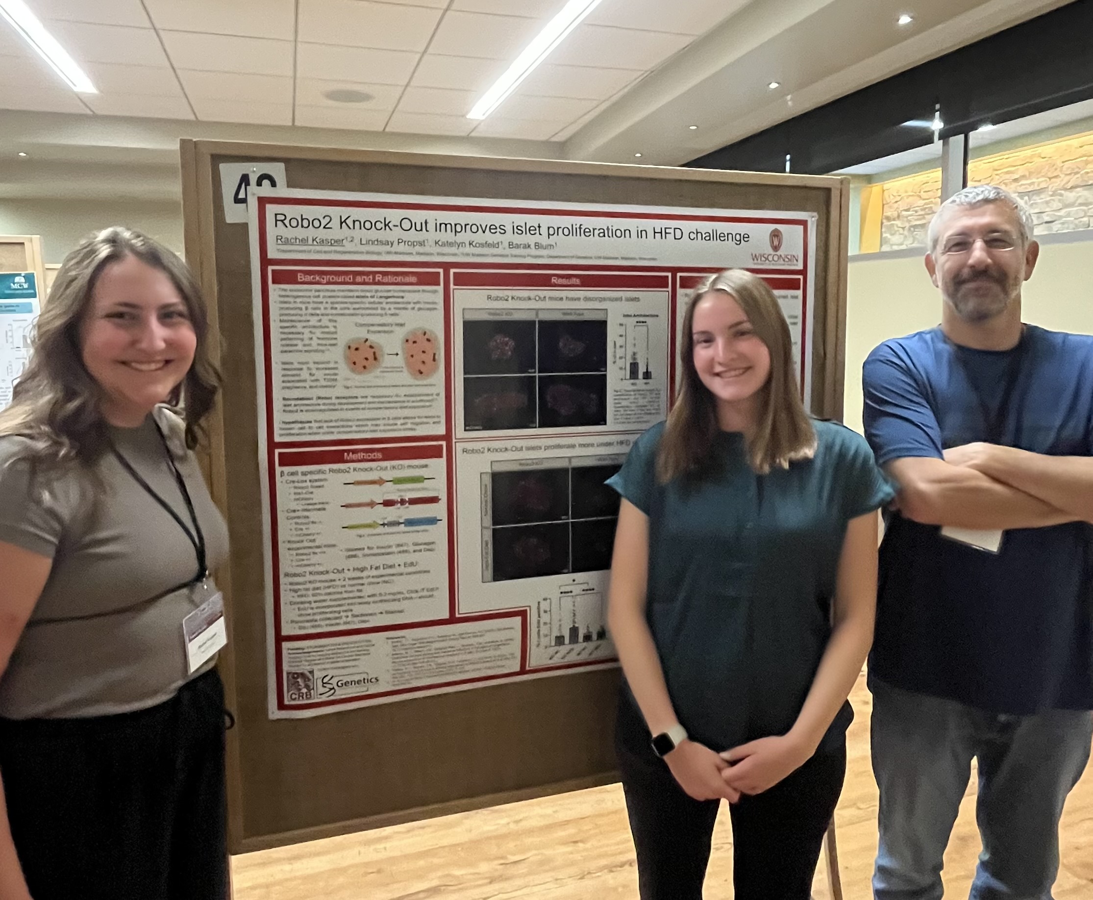 Barak, Rachel, and Katelyn standing in front of Rachel's poster while at Diabetes Day on September 11th, 2025.